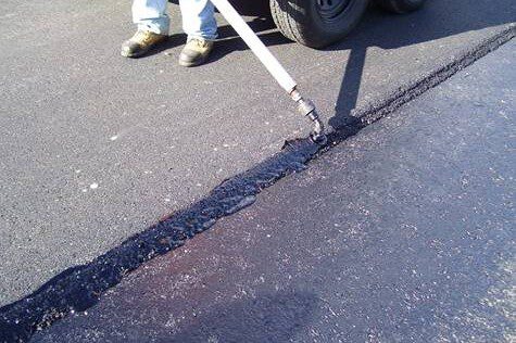 Application de joint d'asphalte à froid
